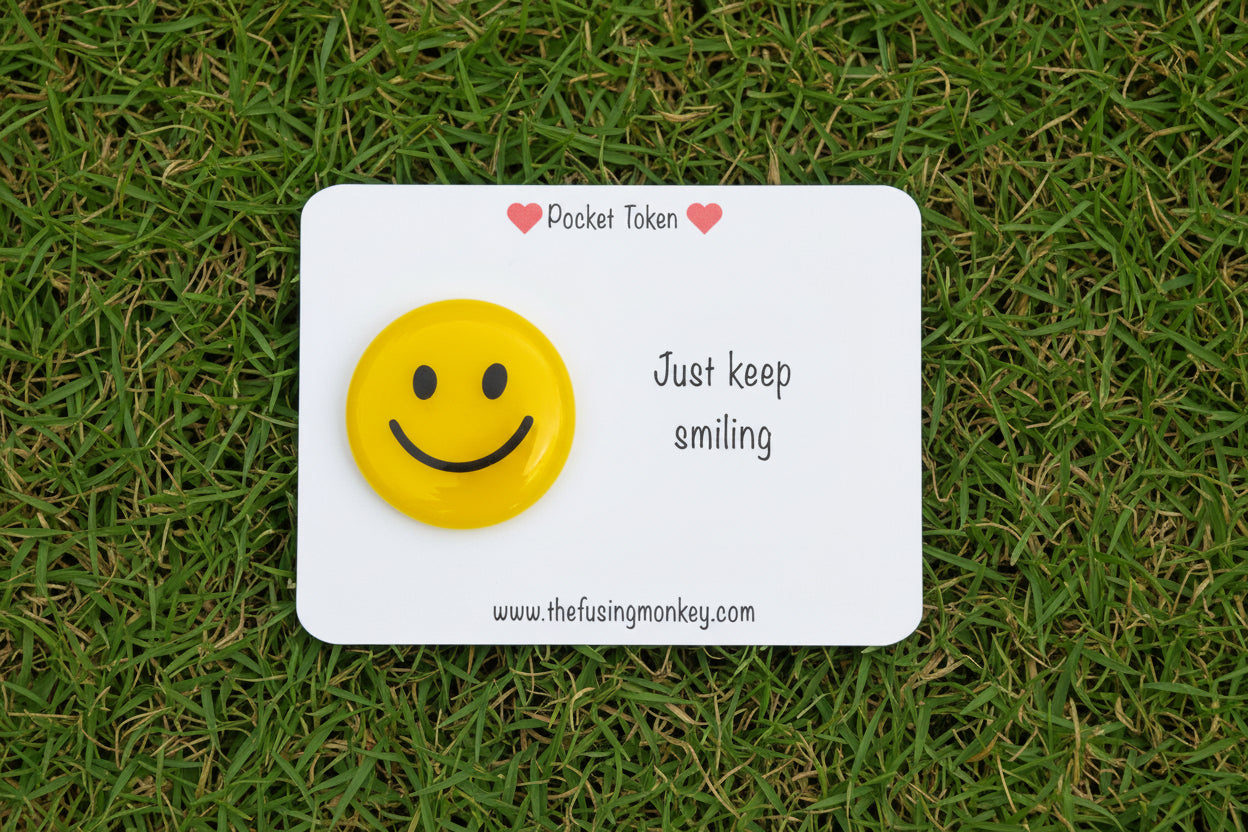 Just Keep Smiling Glass Token