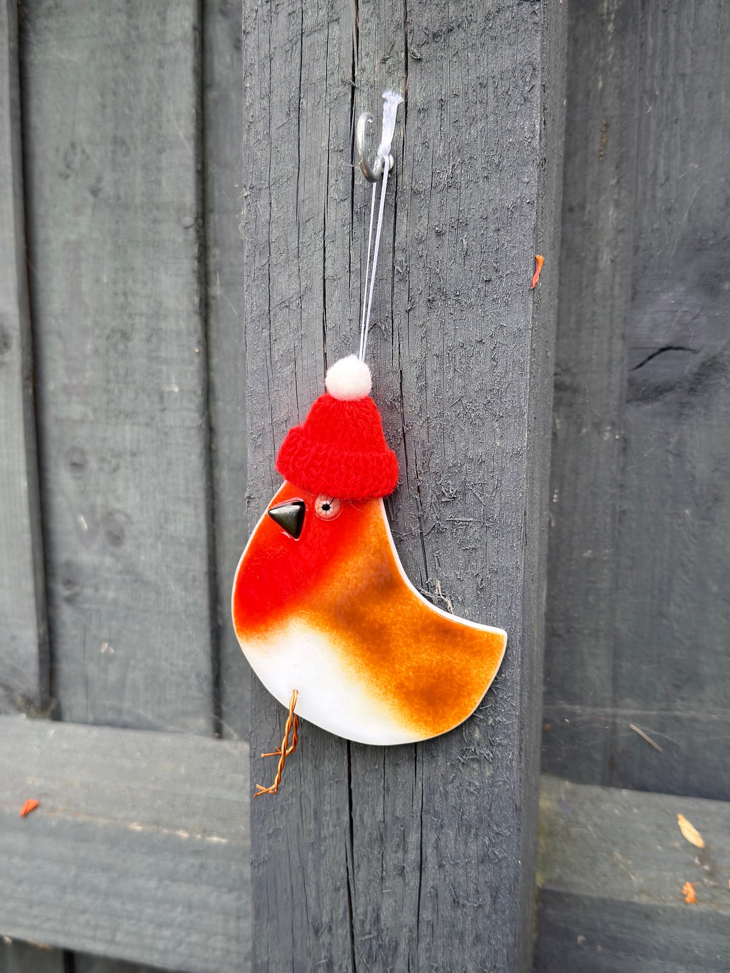 Fused Glass Robin with hat on white glass
