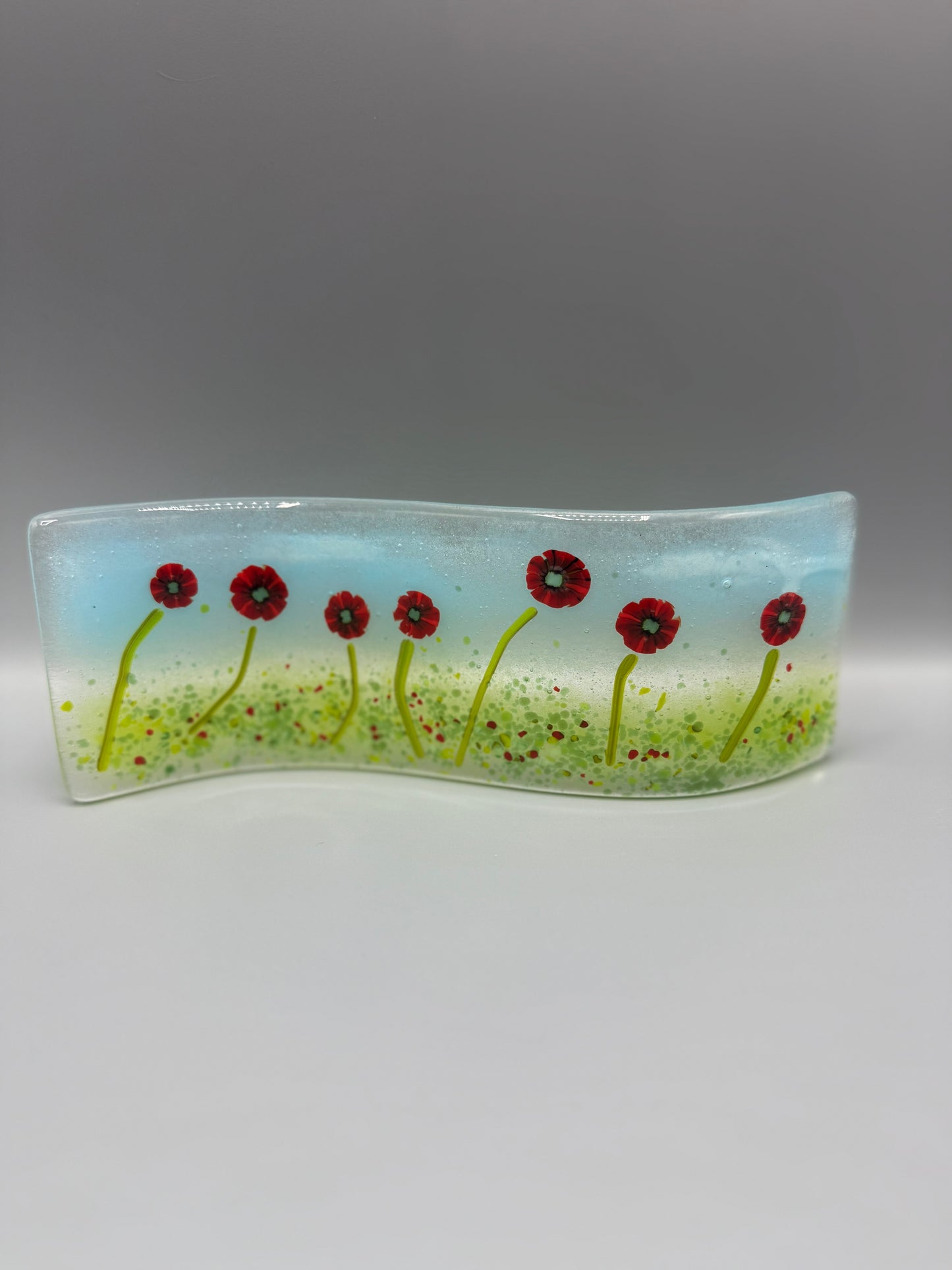 Poppies in grass meadow fused glass wave