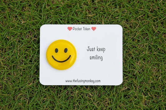 Just Keep Smiling Glass Token